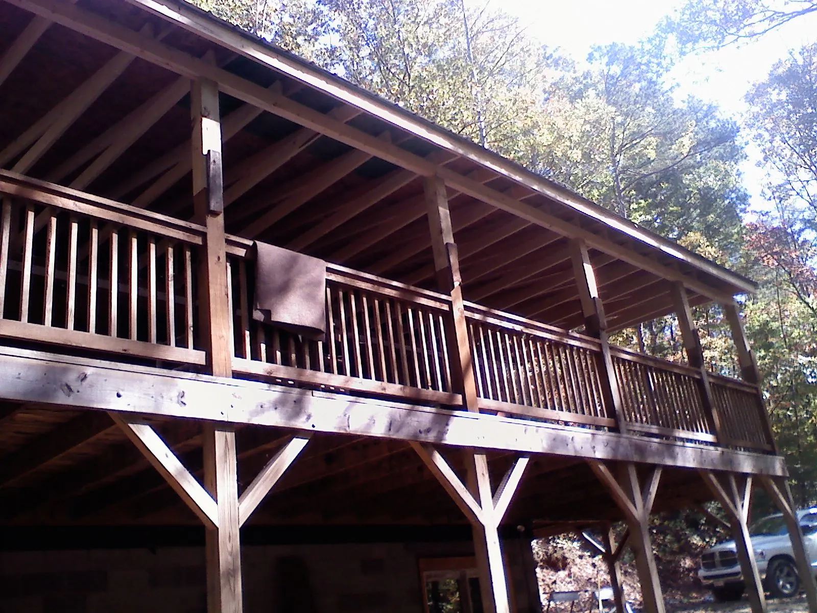 Timber framing under a new elevated porch and deck — Roof Leak Repair in Markleysburg by Roofing Brothers